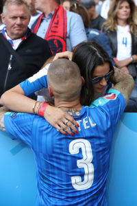 LILLE, FRANCE - JUNE 26: Martin Skrtel of Slovakia is consoled by his wife Barbora Lovasova at the end of the UEFA Euro 2016 Round of 16 match between Germany and Slovakia at Stade Pierre-Mauroy on June 26, 2016 in Lille, France. (Photo by Matthew Ashton - AMA/Getty Images)